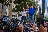 Opposition leader Maria Corina Machado and politician Juan Pablo Guanipa, appear at the opposition rally called by her, in the streets of Caracas.