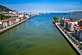 Mouth of the Nervion River from Vizcaya Bridge, a transporter bridge that links the towns of Portugalete and Getxo, Bilbao province, Basque Country, Euskadi, Spain.