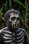 The Skeleton Men from the Omo Bugamo tribe of Papua New Guinea paint their bodies with black and white paint emulating the human skeleton, Chimbu Province, Papua New Guinea