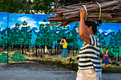 local woman carry wood in Sipaway Island, San Carlos City, Negros Occidental, Philippines