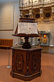 Carved wooden choir lecturn from the 16th Century in the Duomo Museum in Florence, Italy.