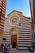 The medieval Church of San Giovanni Battista in Monterosso al Mare, Cinque Terre, Italy. The facade is black and white marble.