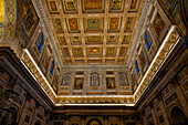 The ornate ceiling of the transept of the Basilica of St. Paul Outside the Walls, Rome, Italy.