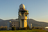 The air traffic control tower at the Amerigo Vespucci Airport, the international airport in Florence, Italy.