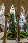 The arches and colonnades of the Paradise Cloisters of the Amalfi Duomo, Amalfi, Italy.