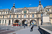 Pont du Carrousel, Seine River, and Musee du Louvre. Built in the 20th century to replace the original 19th century structure, Louvre Palace, Paris, France