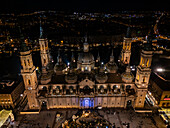 Aerial view of the Cathedral Basilica of of Our Lady of the Pillar and El Pilar square illuminated at night during Christmas, Zaragoza, Spain