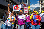 Supporters of Nicolas Maduro's government celebrate on their platforms, prior to the presidential swearing-in on January 10, 2025.