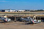 Regional airliners at the Terminal E satellite terminal at Dallas Fort Worth International Airport. Dallas, Texas.