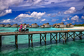 Happy staff of the luxury water villas of Six Senses Laamu maldives luxury resort villas, Laamu Atoll region Maldives