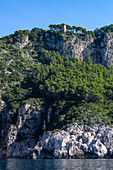 An old watchtower on the cliffs on the west coast of Capri, Italy. Towers and forts were built starting in the 9th Century to protect the island from raids by Saracen pirates.