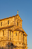 The south facade of the Pisa Duomo or Primatial Metropolitan Cathedral of the Assumption of Mary in Pisa, Italy.