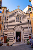 The Oratorio Mortis and Orationis Church in Monterosso al Mare, Cinque Terre, Italy. The facade is black and white marble.