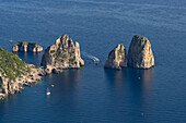 The Farallon Islands or faraglioni, sea stacks off the coast of the island of Capri, Italy, viewed from Monte Solaro.