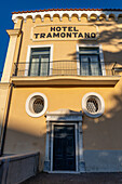 A side entrance to the Imperial Hotel Tramontano facing the Piazza della Vittoria in Sorrento, Italy.