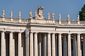 Statues on top of the portico around Saint Peter's Square in Vatican City in Rome, Italy.