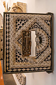 Marble panel with a metal door from the Batistery in the Duomo Museum in Florence, Italy. Circa 13th Century with door added in the 15th Century.