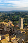 Torre dei Becci overlooks the Piazza della Cisterna in the medieval walled city of San Gimignano, Italy.