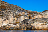 Skjoldungen or Saqqisikuik was a settlement on the east coast of Greenland which is now used as an oil depository, fishing grounds, and also a place where people from Tasiilaq go to get angelica. The surroundings are almost otherworldly beautiful. The area is lush with towering peaks. The area has been inhabited several times, most lately from the 1930s until 1964, when the inhabitants were relocated. This happened mainly due to a political wish to concentrate Greenland’s inhabitants in larger towns.