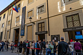 Visitors in line to enter the Accademia Gallery in Florence, Italy.