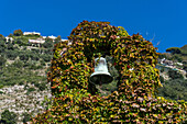 A small bell tower covered with grape vines on the Amalfi Coast in Italy.