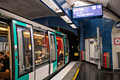 People getting off the Paris Metro underground train at Alma Marceau station Montmartre Paris France EU Europe