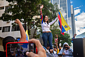 The leader of the opposition Maria Corina Machado, appears at the rally of the opposition called by her, in the streets of Caracas.