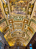 Ornate ceiling of the Gallery of Maps in the Vatican Museums, Vatican City, Rome, Italy.