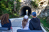 Canal du Midi at tunnel du malpas Colombiers Aude South of France southern waterway waterways holidaymakers queue for a boat trip on the river, France, Europe