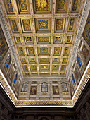 The ornate ceiling of the transept of the Basilica of St. Paul Outside the Walls, Rome, Italy.