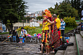 Artists prepare to take to the road in the parade of choreographic collectives in the Canto a la Tierra, part of the Carnival of Blacks and Whites in Pasto, Nariño, Colombia, on January 3, 2025.