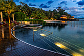 Pool and restaurant of The Ritz-Carlton Langkawi luxury hotel in Langkawi, Malaysia.