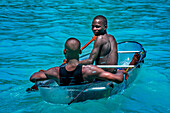 Fishermen in the waterfront beach in Île-à-Vache, Sud Province, Haiti