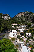 Luxury villas on the steep hills above Praiano on the Amalfi Coast, Italy.