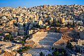 Roman amphitheater and cityscape view of capital Amman, Jordan, Middle East, Asia