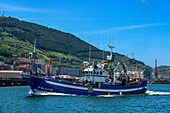 Fishing boat in Santurce Santurtzi harbour, Bizkaia, Bilbao province, Basque Country, Euskadi, Spain.