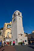 The Piazzetta or Piazza Umberto I, the main square with its clocktower in the center of the town of Capri, Italy.