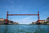 Vizcaya Bridge, a transporter bridge that links the towns of Portugalete and Getxo, Bilbao province, Basque Country, Euskadi, Spain.