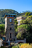 Old stone towers renovated for modern living in Monterosso al Mare, Cinque Terre, Italy.