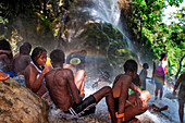 Haiti Voodoo Festival in Saut d'Eau, in Saut d'Eau, Ville Bonheur, Haiti. Thousands of both Vodou and Catholic followers gathered under the Saut d'Eau waterfall in Haiti. The pilgrimage, made by Voodou practitioners and Catholics alike, originated with the sighting of the likeness of the Virgin Mary on a palm leaf close to the falls half a century ago. Catholism and Voodou practices are forever intertwined in its Haitian form. The appearance of a rainbow beneath the falls is said indicate that Danbala - the great lord of the waterfall - and Ayida Wedo - the rainbow - are making love. Fertility