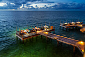 Over water restaurant of Six Senses Laamu maldives luxury resort villas, Laamu Atoll region Maldives