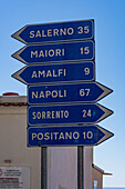 Road signs on SS163 in the resort town of Praiano, Italy, on the Amalfi Coast of the Gulf of Salerno.