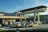 The storage yard and gantry crane for a marble supplier in Carrara, Italy.