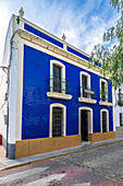 Traditional house with Portuguese-influenced colorful tiles in a picturesque Spanish neighborhood