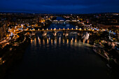 Aerial view of the Stone Bridge illuminated at night during Christmas, Zaragoza, Spain