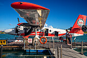 Maldives seaplane flying above islands