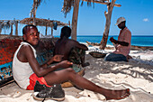 Fisherman fixing the nets in Cayes-à-L’eau, a fishermen islet located northeast of Caye Grand Gosie, Île-à-Vache, Sud Province, Haiti