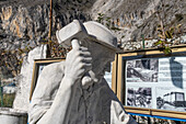 Statue of a quadratore or miner specialized in shaping marble blocks. Fantiscritti Quarry Museum, Carrara, Italy.