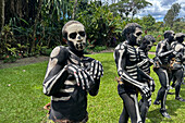 The Skeleton Men from the Omo Bugamo tribe of Papua New Guinea paint their bodies with black and white paint emulating the human skeleton, Chimbu Province, Papua New Guinea