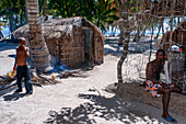 Village and straw house, fishermen's huts on the beach in Cayes-à-L’eau, a fishermen islet located northeast of Caye Grand Gosie, Île-à-Vache, Sud Province, Haiti